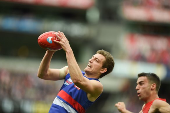 . AFL Grand Final Parade. Western Bulldogs and Sydney Swans. Fletcher Roberts from Bulldogs marks.