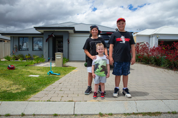 Keyanu Marsh’s children Alex (11), Dylan (9) and Leo (3) outside their Hilbert home.