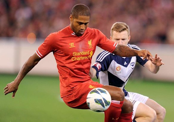 Liverpool's Glen Johnson keeps Scott Galloway at bay.
