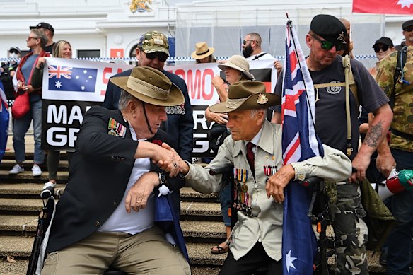 Ex-servicemen Neil Renfree from NSW and John Murphy from Victoria attend the Convoy to Canberra rally at Old Parliament House on Saturday.