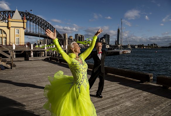 The show must go on. Roger Selby and Sue Johnson practice ballroom dancing in Milson's Point. It all began with an argument about how a certain dance step was done," Mr Selby, who took up dancing four years ago, said. Ms Johnson said the picturesque location is the ideal spot.
"The wharf is sort of shaped like a ballroom and as the weather was warm and beautiful we decided to come back ... it's a great place to practise our rumba and quickstep," she said.
For the past seven weeks several times a week, at an appropriate distance several metres apart, they’ve been "cutting the rug" with everything from Latin to New Vogue flounces like the "Lucille Waltz".