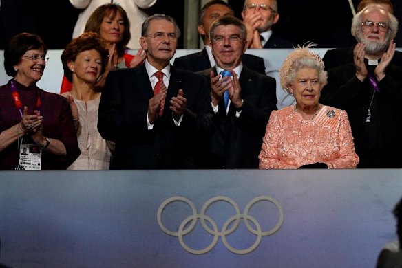 The Queen and Jacques Rogge, left, President of the International Olympic Committee, attend the opening ceremony.