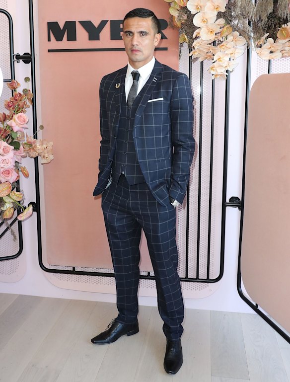 Tim Cahill poses at the Myer Marquee on Derby Day 