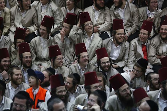 Ultra-Orthodox Jewish men celebrate the holiday of Purim.