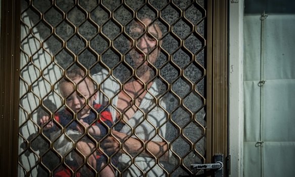 Next door neighbour Briana Zaffina worries about the safety of her family, including 7 month old son Remi.