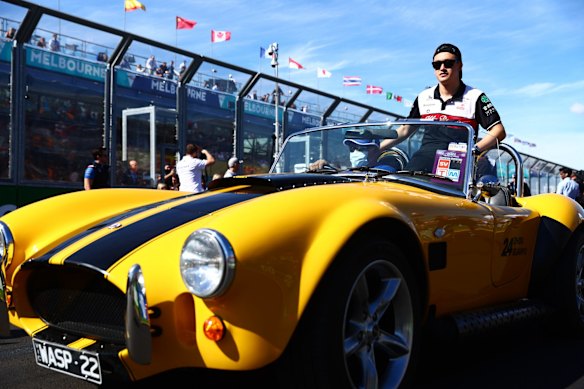 Zhou Guanyu of China and Alfa Romeo F1 looks on from the drivers parade