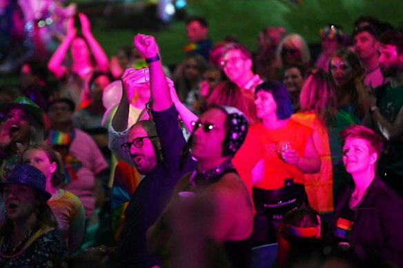 Spectators take in Rita Ora's performance.