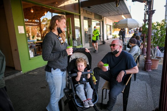 Albert Park residents Prue Lavery and husband Jan Gyrn with their son Kobe  having a coffee at the Guilty Moose cafe in Albert Park.