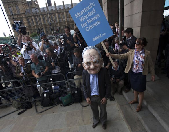 Protesers outside the hearing.