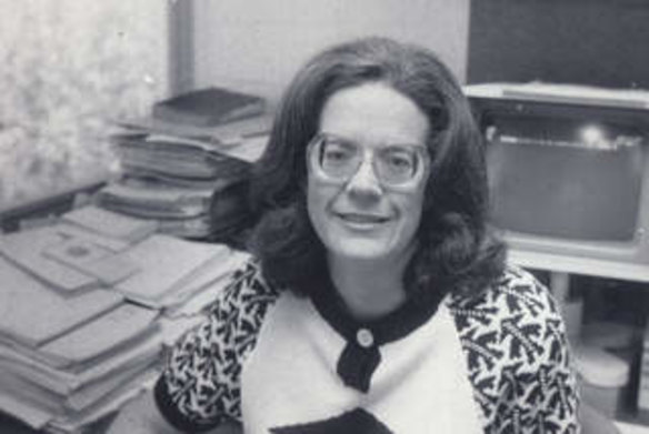 Michelle Grattan surrounded by files in The Age bureau in old parliament house.