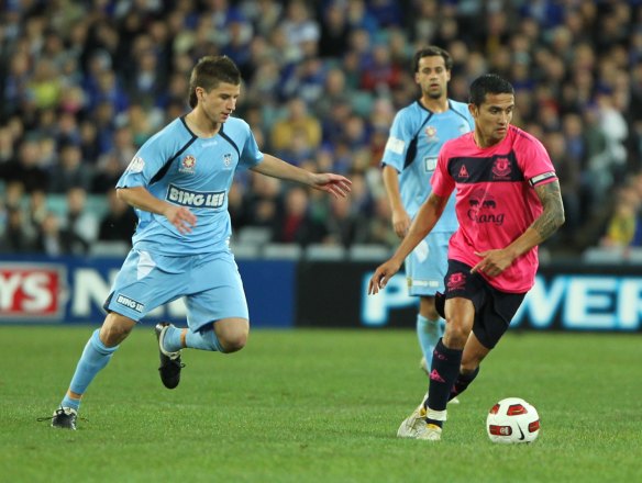 Terry Antonis, with Sydney FC, takes on Tim Cahill's Everton  in a 2010 friendly.