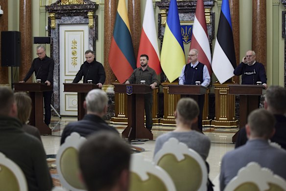 From left: Lithuania's President Gitanas Nauseda, Polish President Andrzej Duda, Ukrainian President Volodymyr Zelenskyy, Latvian President Egils Levits and Estonia's President Alar Karis attend a news conference in Kyiv.
