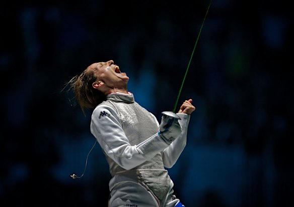 A competitor in the Fencing event screams in triumph at the 2012 London Olympics.