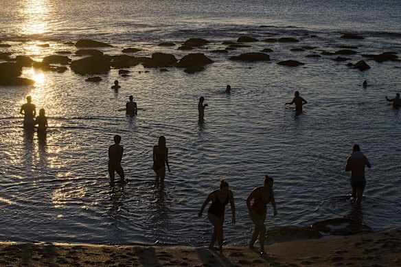 More people than usual take a dip at Bront Beach on Friday morning.