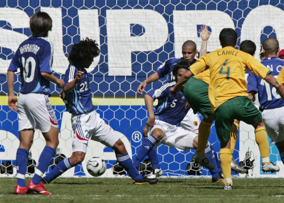 The beginnings: Tim Cahill scores Australia's first goal at a World Cup, his first of a double against Japan in 2006.