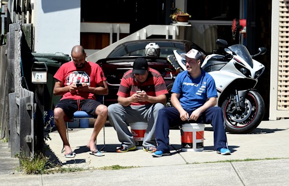 Police are conducting a raid at a home in Meadow Heights in relation to the Christmas terror plot in Meadow Heights. These neighbours set up to watch the scene. 