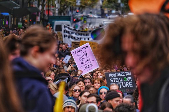 Protesters take part in the Climate Emergency XR Snap Rally in Melbourne.