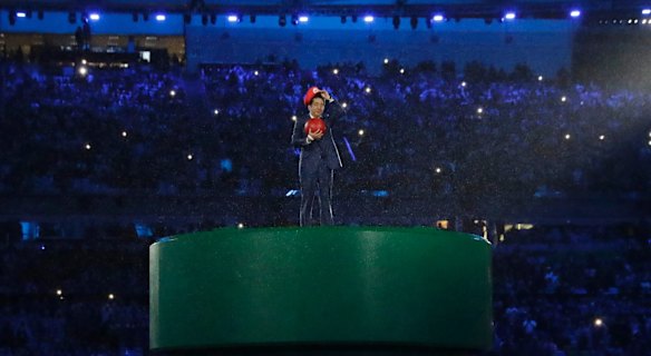 Japan's Prime Minister Shinzo Abe appears during the closing ceremony in the Maracana stadium at the 2016 Summer Olympics.