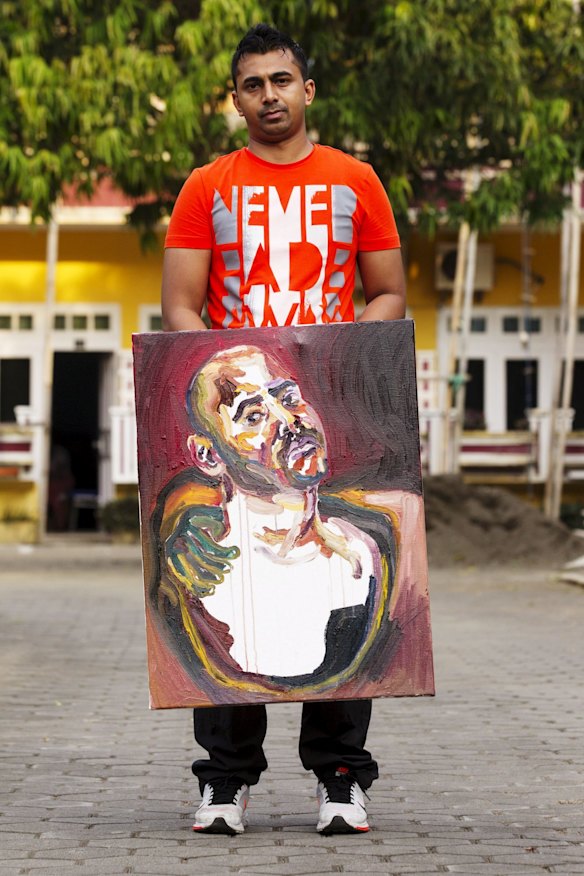 Chintu Sukumaran with artworks by his brother Myuran
