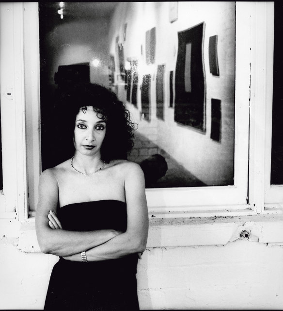 Anna Schwartz at 45 Flinders Lane in April 1988. The window reflection captures an exhibition by Elizabeth Newman, which was to be the last United Artists show before the space became City Gallery. 
