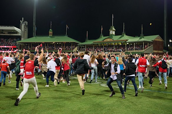 Fans swam onto the field to celebrate.