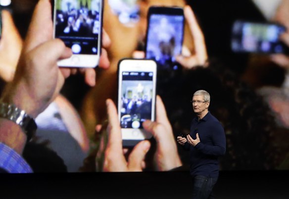Apple CEO Tim Cook announces the new iPhone 7 during an event in San Francisco.
