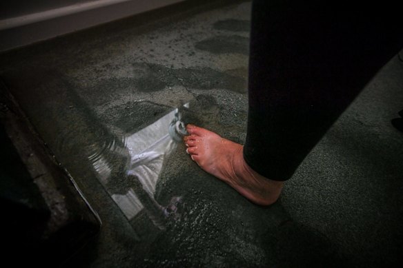 Flood water makes its way into the living room.