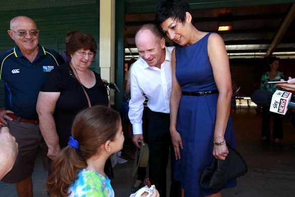 Premier Campbell Newman speaking to members of the public at Newmarket State School on election day, Brisbane.