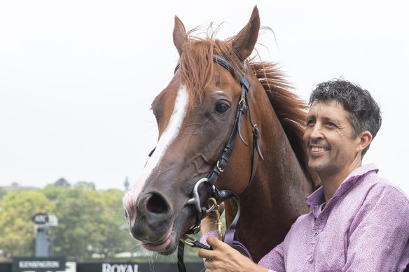 Trainer Aiden St Vincent with stable star Hellenism after winning a Highway at Randwick.