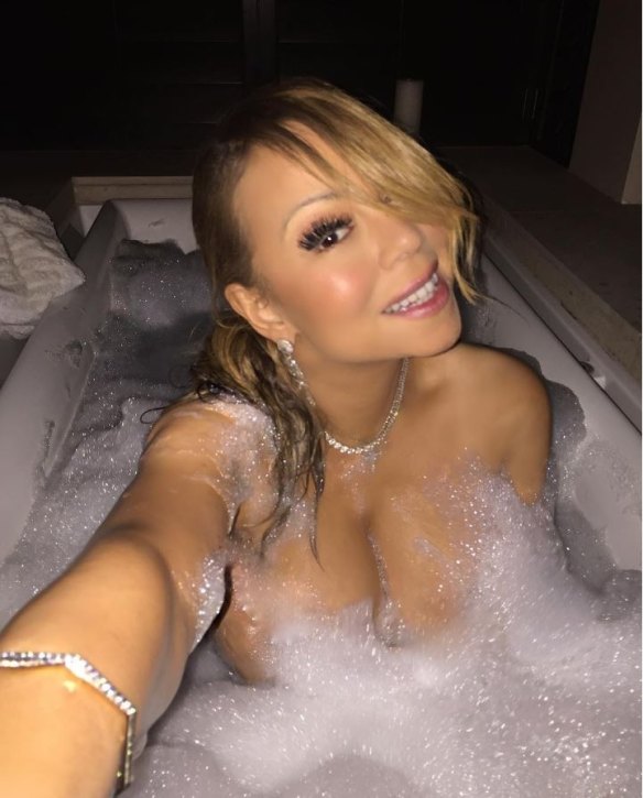 Instagram posted image of Mariah Carey in a bathtub with diamonds.