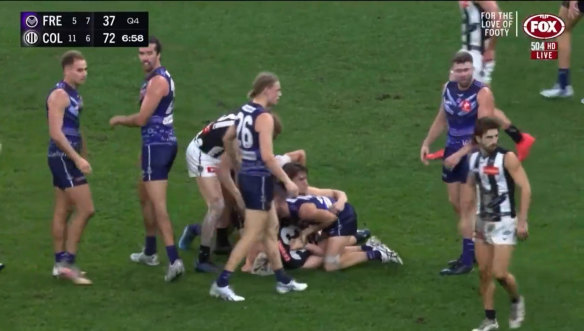 Sam Switkowski was banned for two weeks for serious misconduct for pulling Jack Ginnivan’s arm up his back in a “chicken wing” tackle