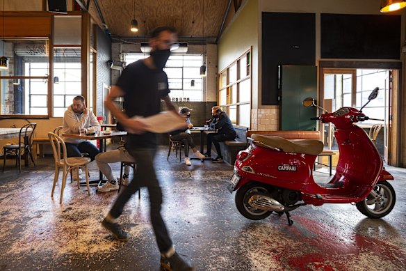 People dining inside St. Ali Cafe in South Melbourne.