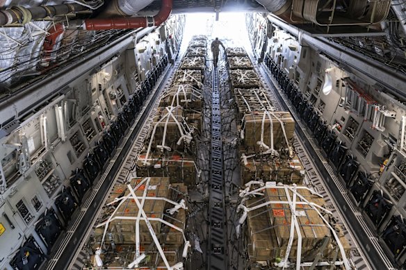 A C-17 cargo aircraft is loaded with 155mm shells and fuses, bound for Ukraine, at Dover Air Force Base, Delaware, US.