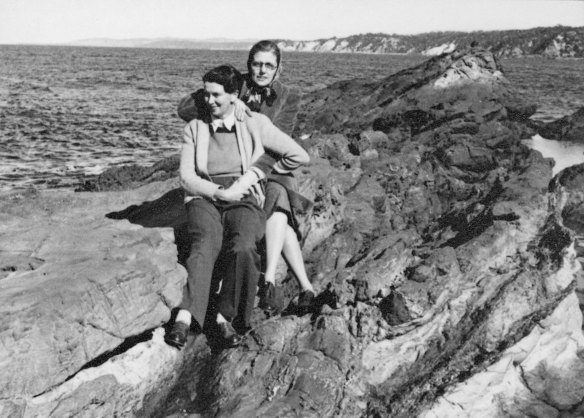 Isobel Bennett and (possibly) Gladys Dakin on a rocky ledge, NSW, 1946–50.