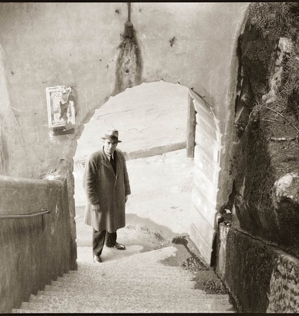 A detective at the bottom of the Argyle Stairs in the Rocks c.1930. They feature in the Justice and Police Museum's forensic archive (1910 to 1964). Curator Nerida Campbell says stairs are often the scene of accidents that "don't turn out to be accidents".