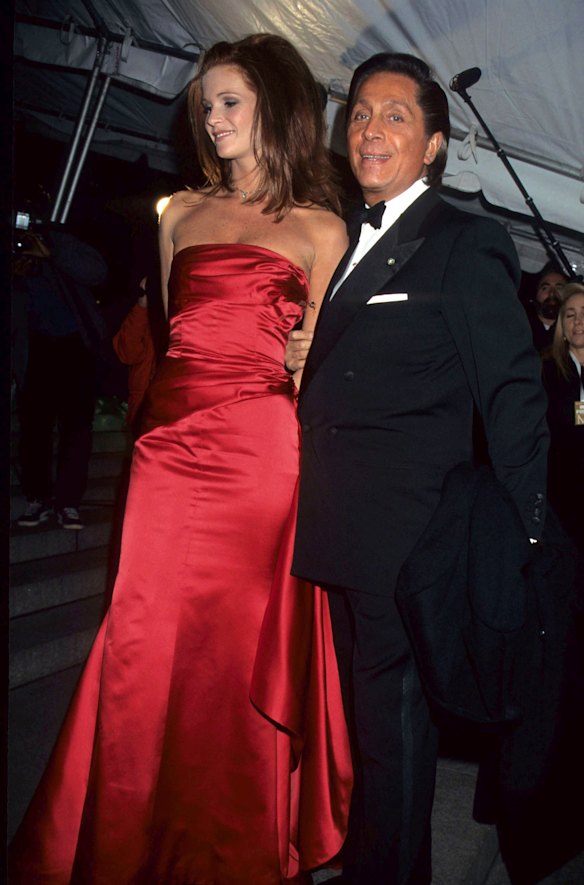Elle Macpherson with Valentino in one of his designs at the 1995 Met Gala in New York.