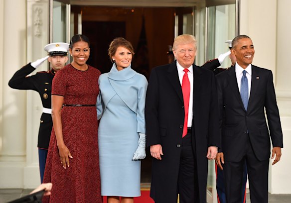 I don't know what's more awkward here. Their fake smiles or Trump's XXXL tie.