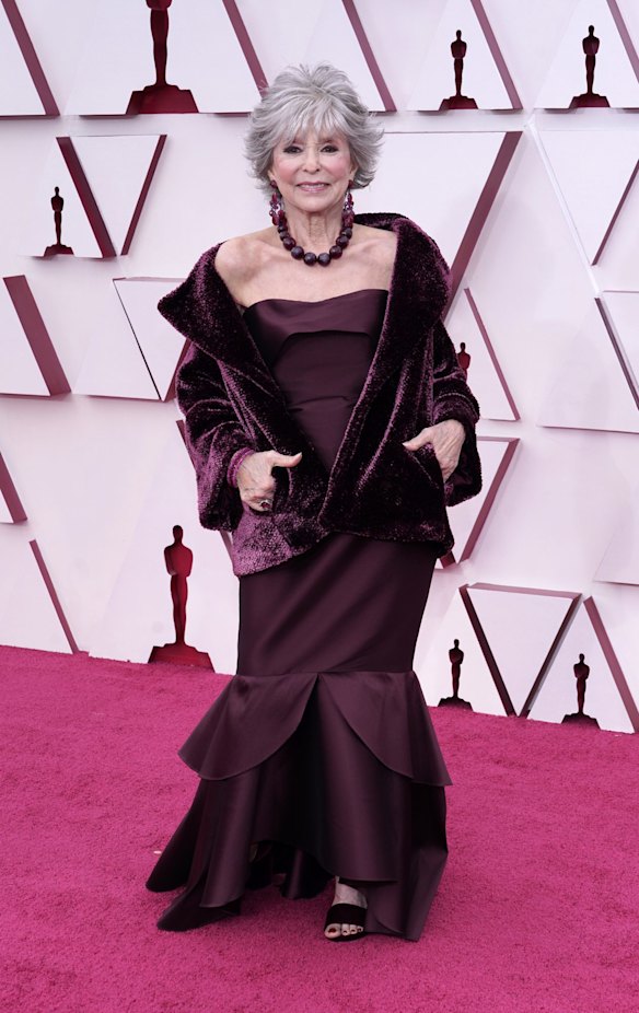 Rita Moreno arrives at the Oscars.