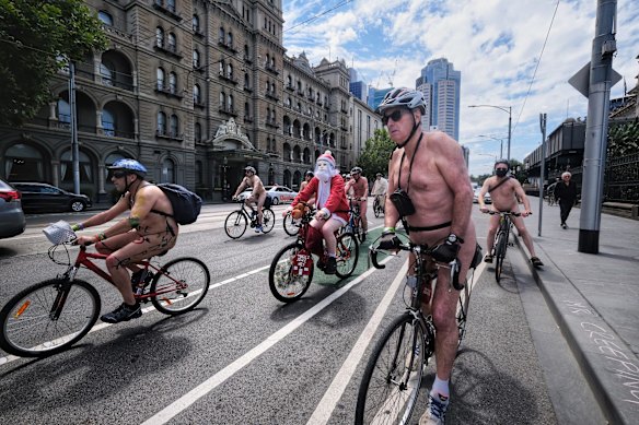 Santa makes an appearance at the World Naked Bike Ride in Melbourne.