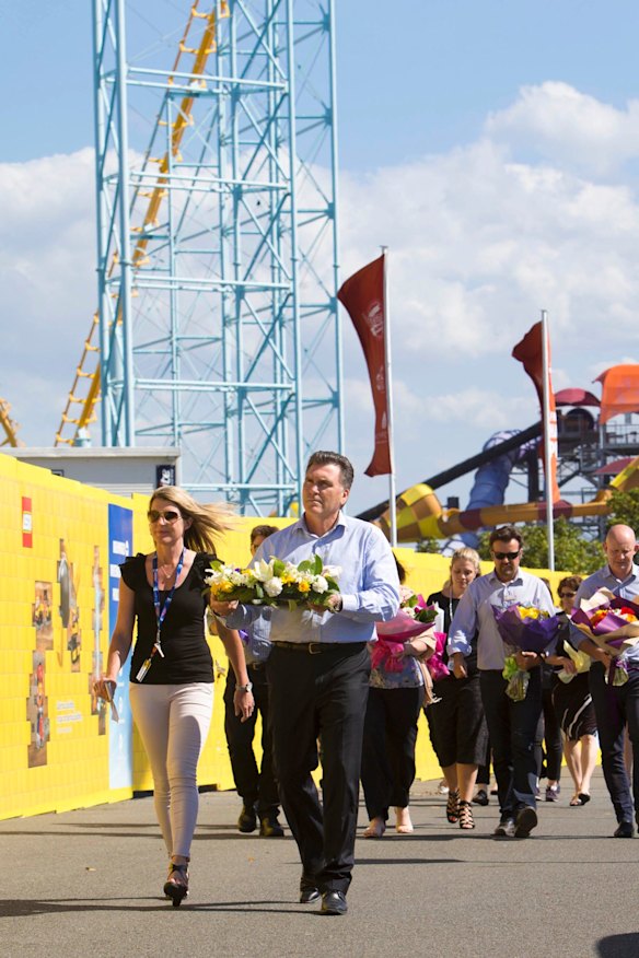 Dreamworld CEO Craig Davidson and his employers grieve and pay their respects at Dreamworld where four people died after a malfunction with the 'Thunder River Rapids' at the theme park.