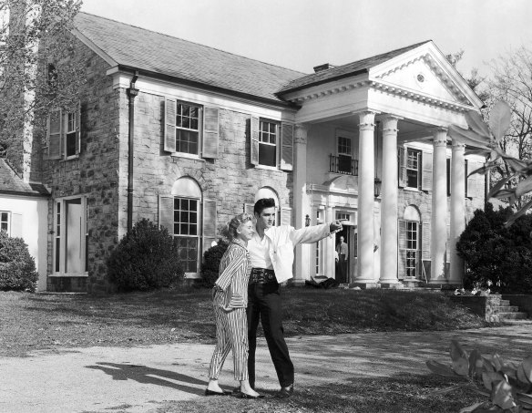 Elvis Presley with his girlfriend Yvonne Lime at Graceland circa 1957. 