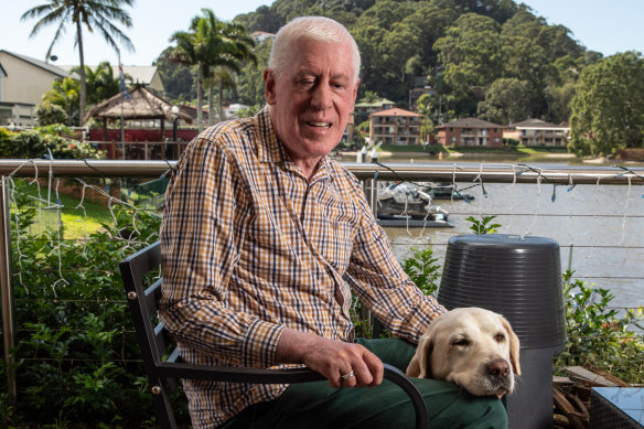 Graeme Innes, with his dog, is fighting to change the way people with disabilities are treated on airlines and at airports.