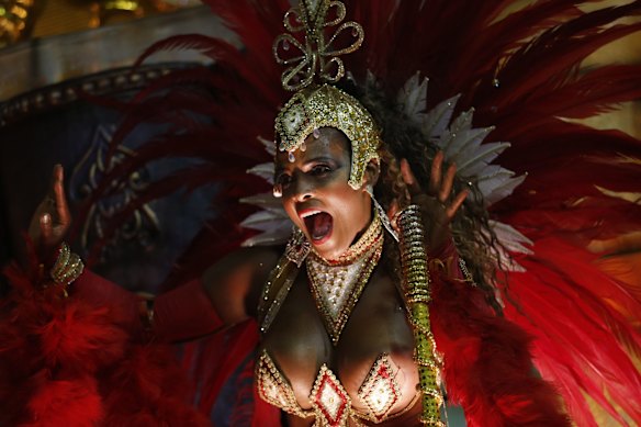 A performer from the Viradouro samba school parades during Carnival celebrations at the sambadrome in Rio de Janeiro, Brazil.