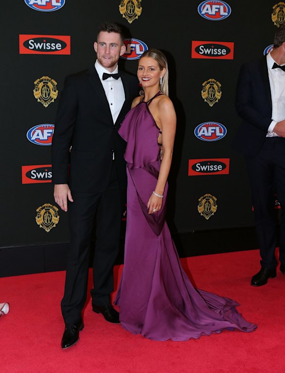Melbourne footballer Jeremy Howe poses for a photo with his partner Kahila Ashton on the red carpet ahead of the 2015 AFL Brownlow Medal count at Crown Palladium.