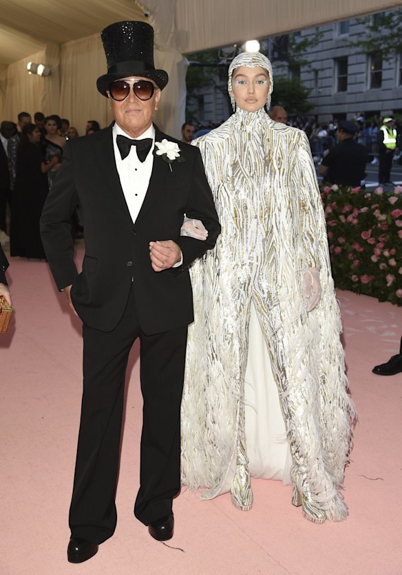 Michael Kors, left, and Gigi Hadid attend The Metropolitan Museum of Art's Costume Institute benefit gala celebrating the opening of the "Camp: Notes on Fashion" exhibition.