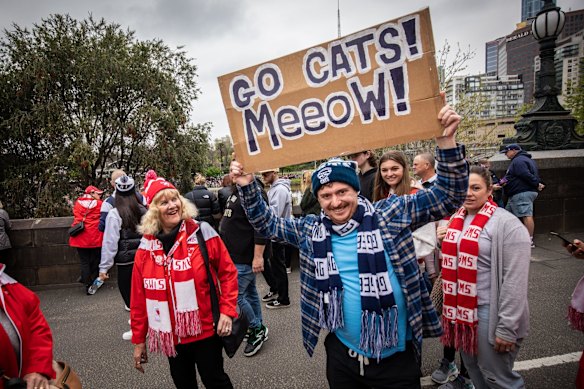 Swans and Cats fans attend the AFL Grand Final parade 