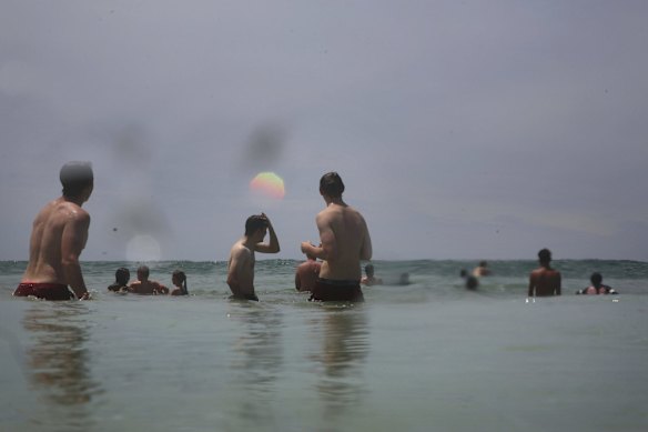Bathers take refuge from the heat at Maroubra Beach.