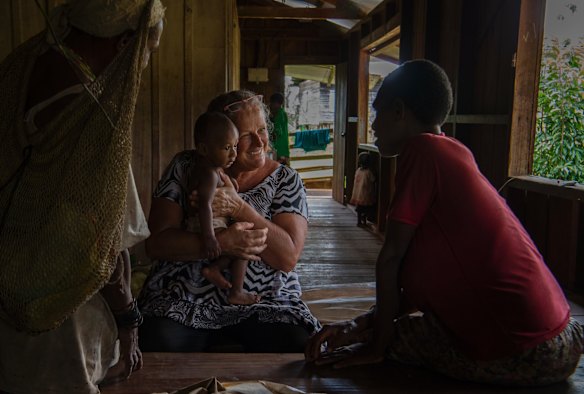 Sally Lloyd visiting Mougulu health center ward, Mougulu village.