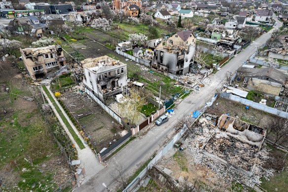 As seen from the air, wrecked homes stand near the former front line between Russian and Ukrainian troops in Hostomel. As Russia concentrates its attack on the east and south of the country, residents of the Kyiv region are returning to assess the war's toll on their communities.