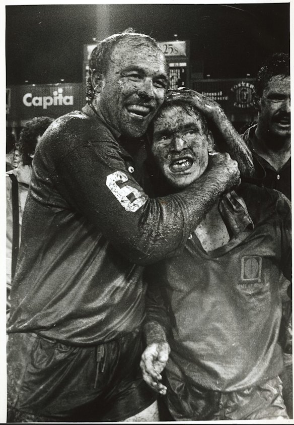Wally Lewis and Allan Langer from Queensland celebrate victory in a State of Origin rugby league match in Sydney.